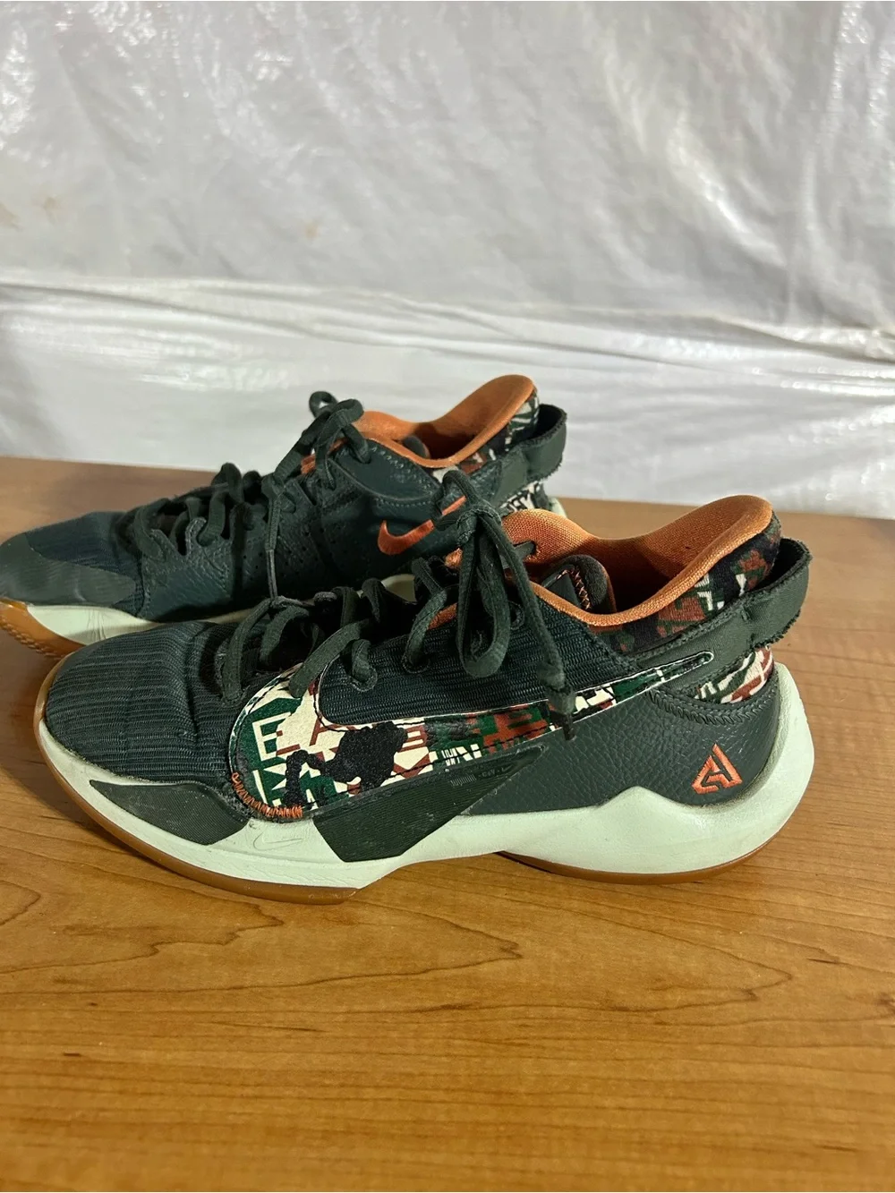 Nike Kids Low-Top Sneakers in Dark Green and Orange with Printed Accents
